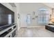 Bright living room boasts vaulted ceiling, multiple windows, and neutral decor at 2418 Antler Point Dr, Henderson, NV 89074