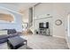Living room showcases tile floor, neutral color, stairs to second floor, and natural light at 2418 Antler Point Dr, Henderson, NV 89074