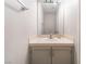 Cozy bathroom with sink, cabinet, vanity and a mirror at 2452 Silver Shadow Dr, Las Vegas, NV 89108