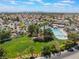 A community pool surrounded by various trees and foliage at 2452 Silver Shadow Dr, Las Vegas, NV 89108