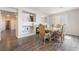 Stylish dining room with a fireplace, modern flooring, and decorative furniture, ideal for entertaining guests at 2452 Silver Shadow Dr, Las Vegas, NV 89108