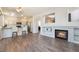Modern kitchen with stainless steel appliances, a breakfast bar, and seamless access to an outdoor area at 2452 Silver Shadow Dr, Las Vegas, NV 89108