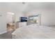 Bright main bedroom with balcony access and ensuite bathroom at 2452 Silver Shadow Dr, Las Vegas, NV 89108