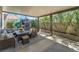 Inviting covered patio with outdoor seating and a play area, perfect for relaxation at 2452 Silver Shadow Dr, Las Vegas, NV 89108