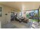 Inviting covered patio with outdoor seating and a playhouse, perfect for entertaining and Gathering fun at 2452 Silver Shadow Dr, Las Vegas, NV 89108