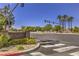 Well-maintained sign for Bella Vista Condominiums, with manicured landscaping and clear street access at 251 S Green Valley Pkwy # 1421, Henderson, NV 89012