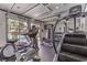 Well-equipped gym featuring modern exercise machines and weights, with natural light at 251 S Green Valley Pkwy # 1421, Henderson, NV 89012