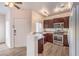 Updated kitchen with granite countertops, stainless steel appliances, and ample cabinet space at 251 S Green Valley Pkwy # 1421, Henderson, NV 89012