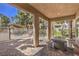Outdoor dining area with a grill and a table with bench seating next to the pool at 251 S Green Valley Pkwy # 1421, Henderson, NV 89012