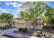 Attractive single-story home featuring a red tile roof, well-kept landscaping, and an attached garage at 2553 Showcase Dr, Las Vegas, NV 89134