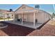 A covered patio stretches across the back of this home at 2621 Blue Reef Dr, North Las Vegas, NV 89032