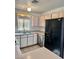 This kitchen features neutral countertops, stainless steel appliances, and ample cabinet space at 2621 Blue Reef Dr, North Las Vegas, NV 89032