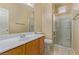 Bathroom featuring a single sink vanity and glass-enclosed shower at 3037 Austin Pale Ave, North Las Vegas, NV 89081