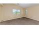 Bedroom features a view through the window with neutral carpet at 3037 Austin Pale Ave, North Las Vegas, NV 89081
