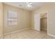 Neutral bedroom, tile flooring, closet, natural lighting and a blank canvas at 3037 Austin Pale Ave, North Las Vegas, NV 89081