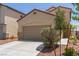 Charming home featuring a two-car garage, neutral tones, and low-maintenance landscaping at 3037 Austin Pale Ave, North Las Vegas, NV 89081