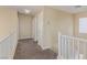 Second floor hallway with neutral carpet leading to various rooms at 3037 Austin Pale Ave, North Las Vegas, NV 89081