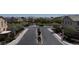 Well-planned neighborhood street scene with landscaping, sidewalks, and easy access to amenities at 3037 Austin Pale Ave, North Las Vegas, NV 89081