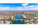 Panoramic aerial view of the community featuring a bridge, lake, and skyline at 3151 Soaring Gulls Dr # 2121, Las Vegas, NV 89128