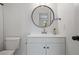 Bathroom features a sleek, modern white vanity and matching fixtures at 3151 Soaring Gulls Dr # 2121, Las Vegas, NV 89128