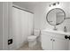 Bathroom featuring a shower, a toilet, and white vanity with storage at 3151 Soaring Gulls Dr # 2121, Las Vegas, NV 89128
