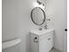 Bright bathroom featuring a modern white vanity with storage at 3151 Soaring Gulls Dr # 2121, Las Vegas, NV 89128
