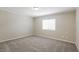 Bedroom featuring carpet flooring and natural light from the window at 3209 Cheltenham St, Las Vegas, NV 89129