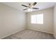 Bedroom featuring a ceiling fan, carpet flooring, and a window at 3209 Cheltenham St, Las Vegas, NV 89129
