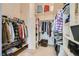 Spacious walk-in closet with built-in shelving and hanging racks for organization and storage at 3231 Rebel Ave, Pahrump, NV 89048