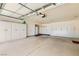 A spacious garage with ample storage cabinets along the walls and a clean epoxy floor at 3231 Rebel Ave, Pahrump, NV 89048