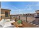 Comfortable balcony with seating, wicker furniture, and neighborhood views at 328 Owens Peak Dr, Henderson, NV 89015