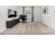 Neutral bedroom with gray carpet, desk, tv, and natural light at 328 Owens Peak Dr, Henderson, NV 89015
