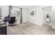 Spacious bedroom with a large window, ample lighting, and a view into other rooms at 328 Owens Peak Dr, Henderson, NV 89015