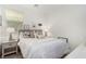Bedroom featuring warm decor and comfortable bed, illuminated by natural light from the window at 328 Owens Peak Dr, Henderson, NV 89015