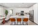 Bright dining area connected to a well-equipped kitchen, perfect for Gathering meals and entertaining at 328 Owens Peak Dr, Henderson, NV 89015