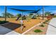 Community playground featuring modern equipment, shade canopies, and a cushioned play surface at 328 Owens Peak Dr, Henderson, NV 89015