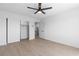 The neutral-toned bedroom has wood-look floors, a closet, and hall access at 3793 Casa Colorado Ave, Las Vegas, NV 89121