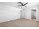Bedroom features wood-look floors, neutral walls, and closet and hallway access at 3793 Casa Colorado Ave, Las Vegas, NV 89121