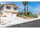 Charming two-story home with a well-maintained front yard and a two car garage at 3793 Casa Colorado Ave, Las Vegas, NV 89121