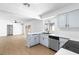 Bright kitchen with stainless steel appliances and a view to an open living space at 3793 Casa Colorado Ave, Las Vegas, NV 89121