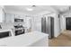 Modern kitchen featuring white countertops, stainless steel appliances, and light blue cabinets at 3793 Casa Colorado Ave, Las Vegas, NV 89121
