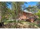 Cozy cabin featuring a wraparound deck with views of the surrounding greenery, ideal for outdoor relaxation at 3971 Arlberg Way, Mount Charleston, NV 89124