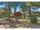 Cozy two-story cabin nestled in a wooded area, blending rustic charm with the tranquility of nature at 3971 Arlberg Way, Mount Charleston, NV 89124