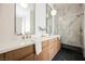 Bathroom featuring double sinks, wood cabinets, marble backsplash, and glass enclosed shower at 4065 Genoa Dr, Las Vegas, NV 89141