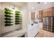 Gourmet kitchen with modern appliances, custom cabinetry, and a convenient wine storage area at 4065 Genoa Dr, Las Vegas, NV 89141