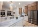 Spacious kitchen with island, stainless appliances, and an open design for modern living at 4065 Genoa Dr, Las Vegas, NV 89141
