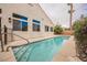 Beautiful backyard pool with convenient walk-in steps at 4065 Genoa Dr, Las Vegas, NV 89141