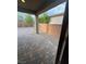 Paver patio and retaining wall with stone area and greenery at 4108 Fairywren Dr, North Las Vegas, NV 89031
