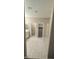 Bathroom featuring dual sinks and large mirrors with access to a powder room, closet, and shower at 4108 Fairywren Dr, North Las Vegas, NV 89031