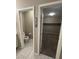Bathroom featuring a toilet and an adjacent large walk-in closet space for storage at 4108 Fairywren Dr, North Las Vegas, NV 89031